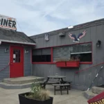 Red and gray exterior of the New Airport Diner on County Road 639 in Wantage, NJ