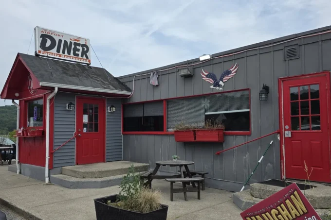 Red and gray exterior of the New Airport Diner on County Road 639 in Wantage, NJ