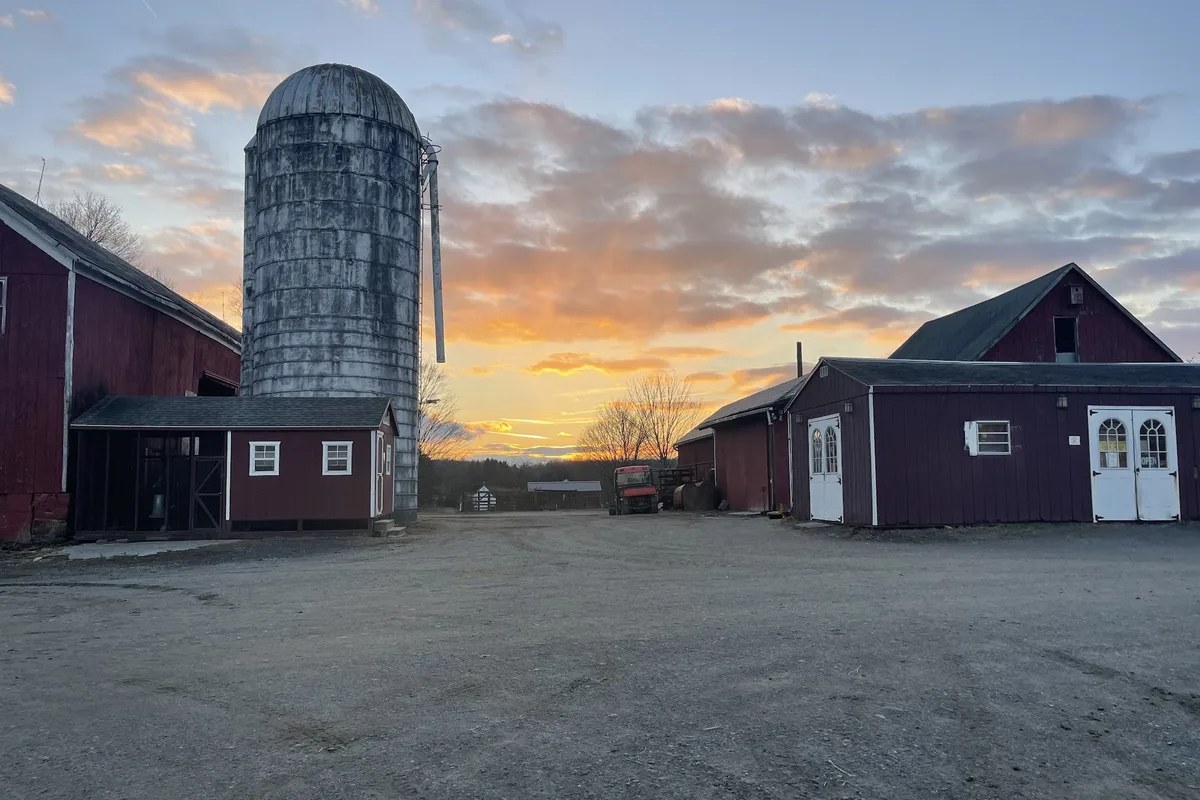 Barns and silo at sunset at Brodhecker Farm on Branchville Lawson Road in Newton, NJ