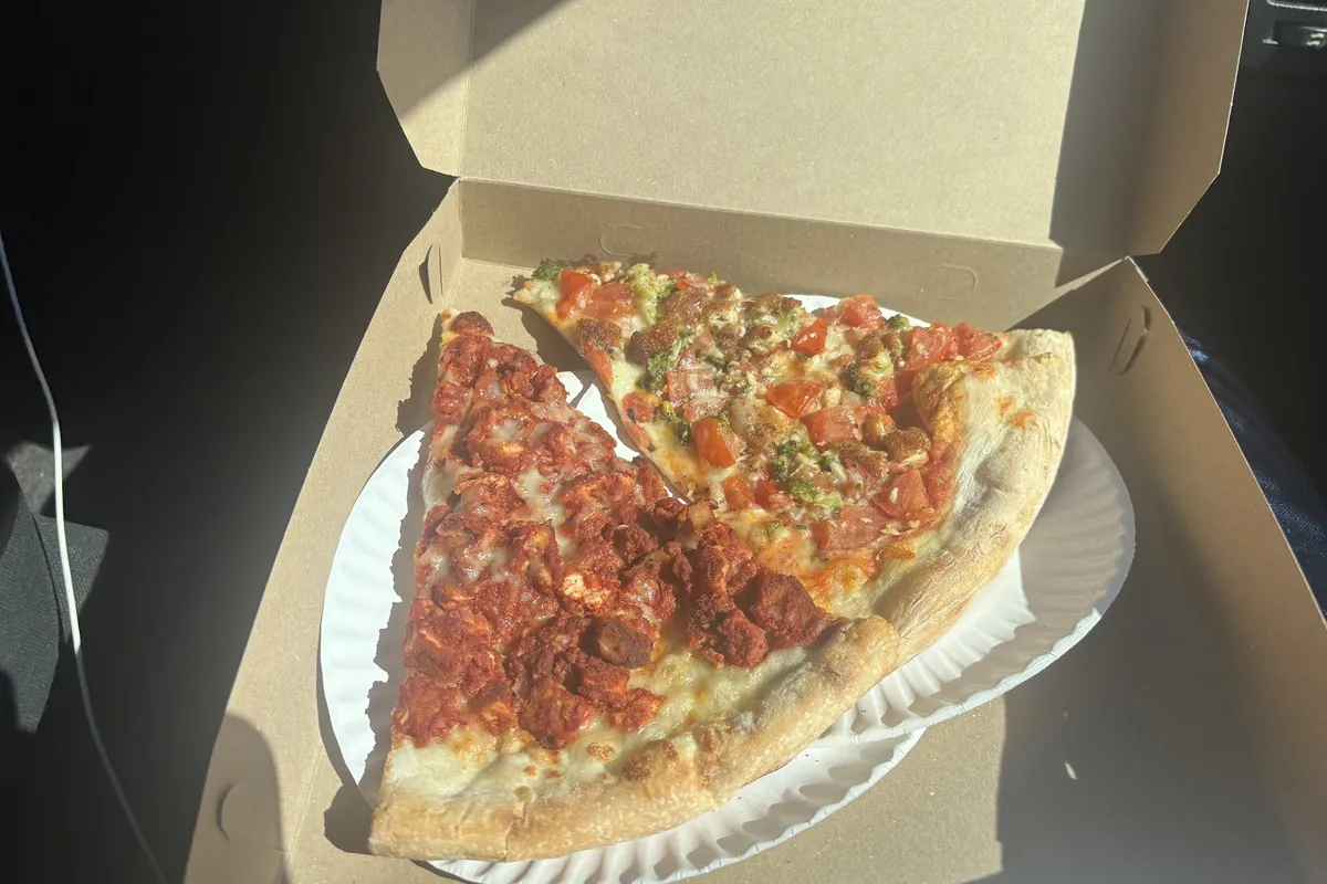 Loaded pizza slice to go from Brothers Pizza and Italian Restaurant in Wantage, NJ