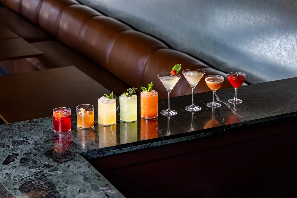 Craft cocktails lined up on the bar at Claremont Distillery in Hamburg, NJ