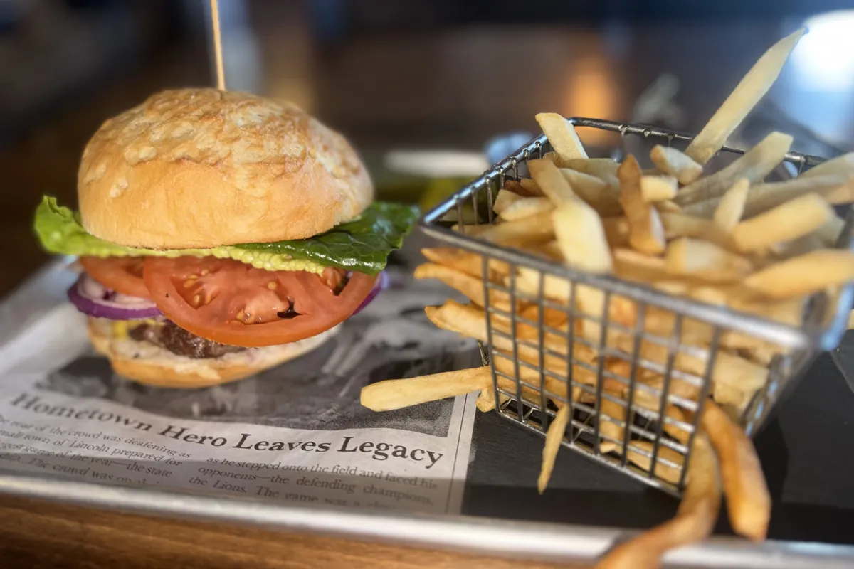 Burger with a basket of fries at Cow Patty's on Route 23 in Wantage, NJ