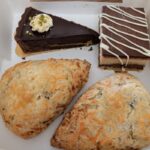 Pastries and cakes in a bakery box from Arbor Bakeshop in Newton, NJ