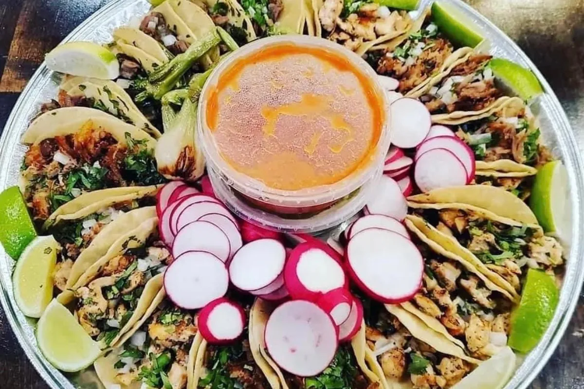 Platter of street tacos with radishes and consome at Green Salsa in Sussex, NJ