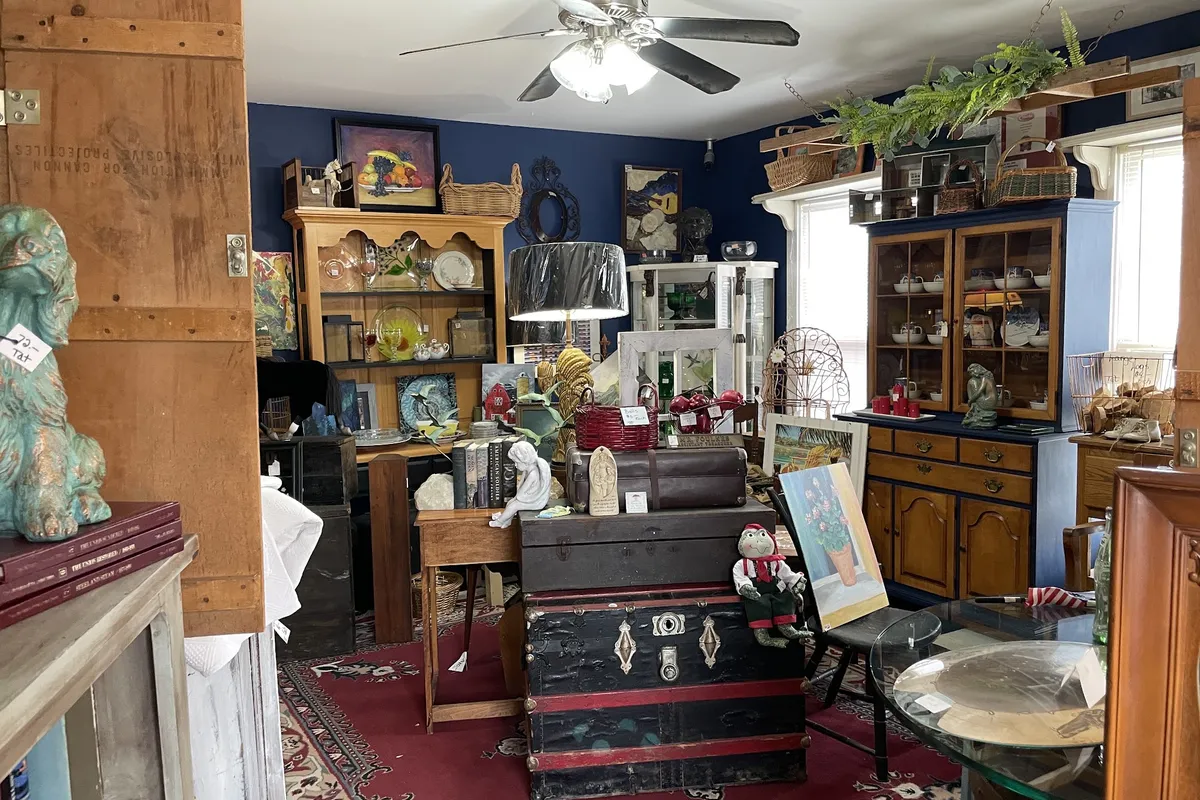 Vintage furniture and decor in the showroom at Grey Barn Antiques in Andover, NJ