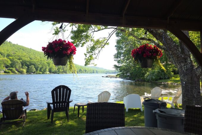 Lakeside pavilion and lawn chairs on Lake Kittatinny at Gyp's Tavern near Branchville, NJ