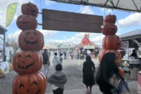 Jack-o-lantern stacks at the Heaven Hill Farm entrance during the Great Pumpkin Festival in Vernon, NJ