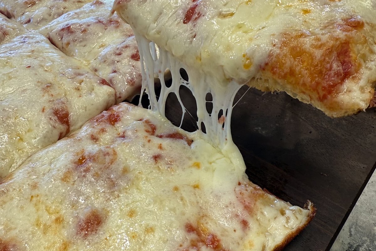 Cheesy square Sicilian pizza slices at Il Gusto Pizzeria on Main Street in Andover, NJ