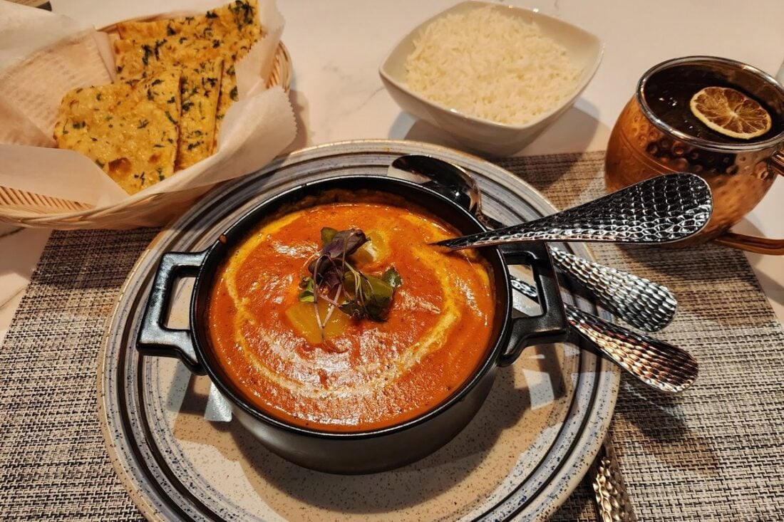 A curry with naan and rice at Indian Spice Route 23 in Sussex, NJ