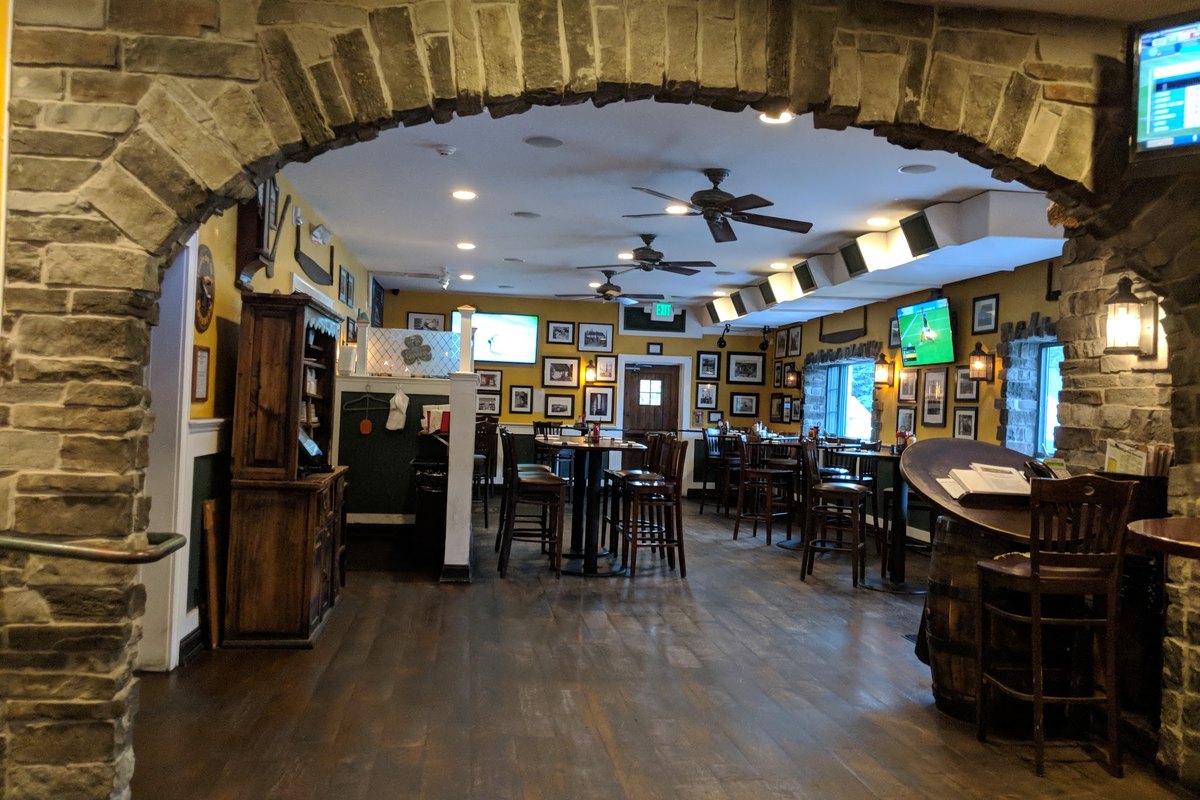 Stone archway leading into a dining room at Irish Cottage Inn in Franklin, NJ