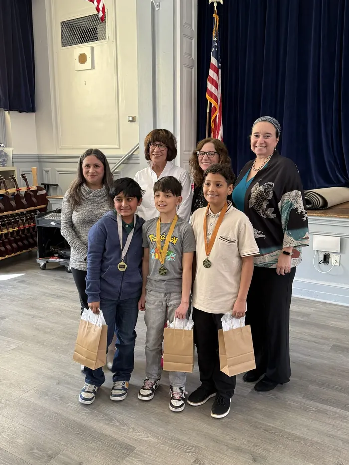 Junior Woman's Club of Sparta members with winners of the club's 2026 Fifth Grade Spelling Bee in Sparta, NJ