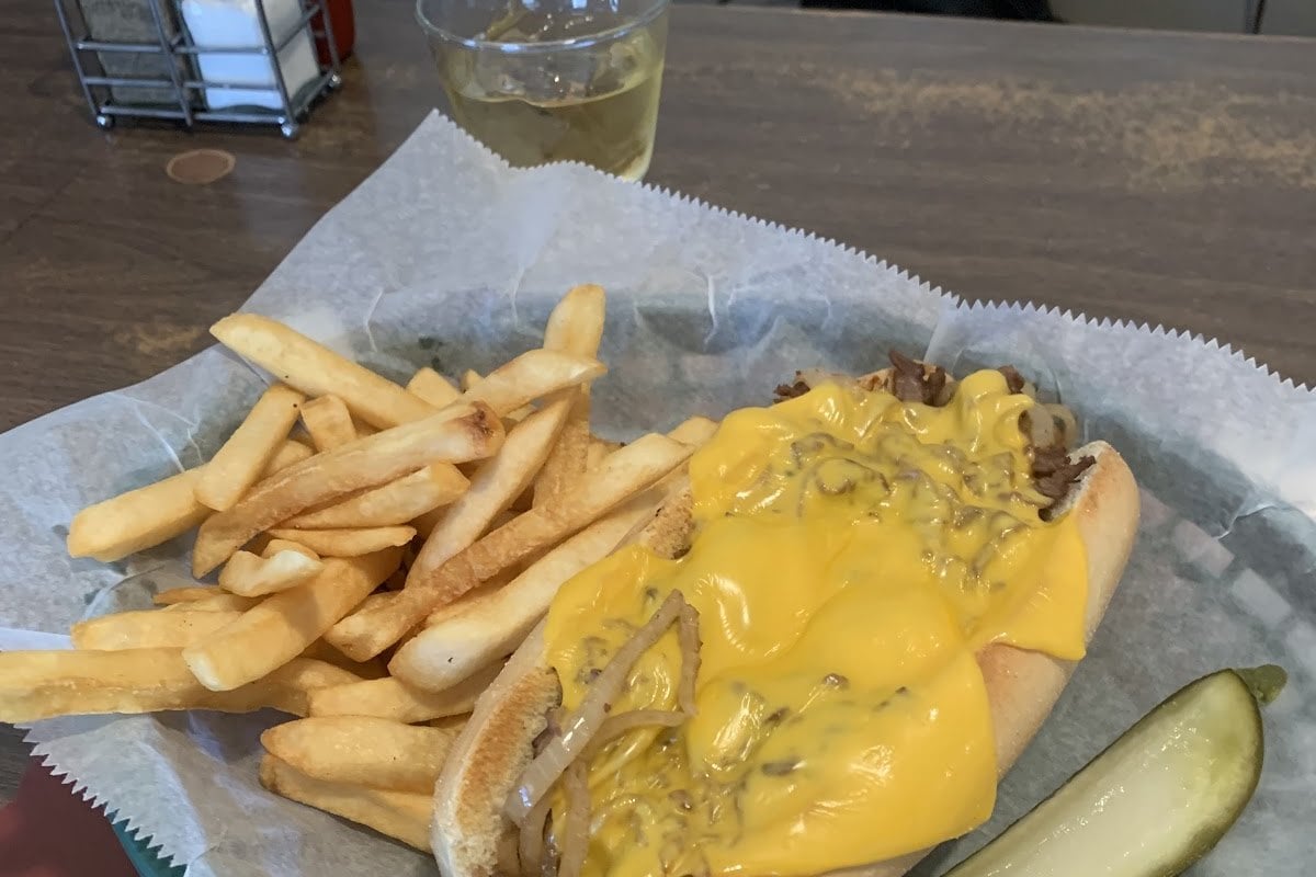 Cheesesteak with fries and a pickle at Lakeside Tavern in Branchville, NJ