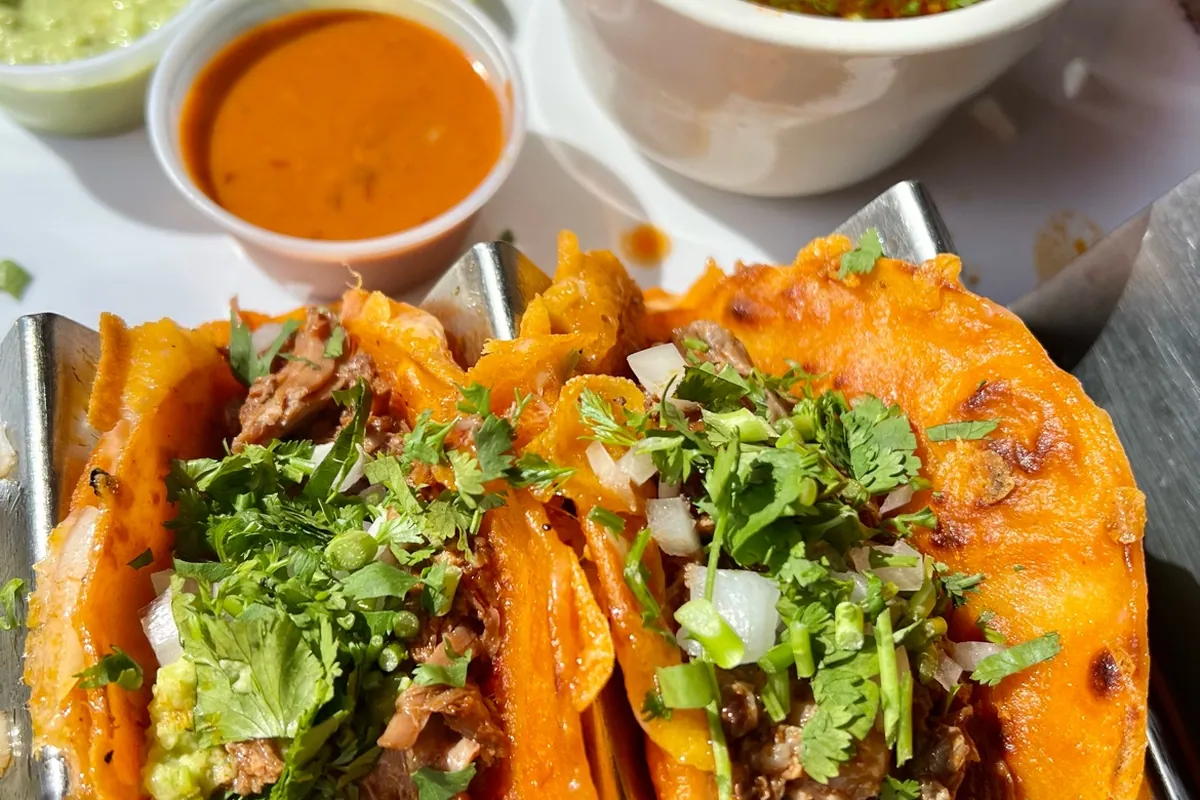 Birria tacos with consome and salsas at Riviera Maya Mexican Restaurant in Branchville, NJ