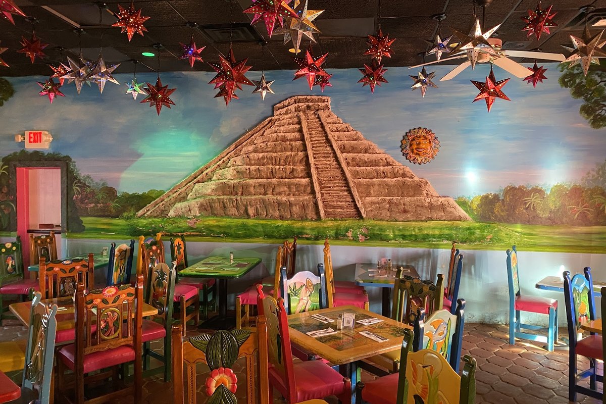 Colorful dining room with a pyramid mural at Riviera Maya Mexican Restaurant in Branchville, NJ