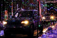 Cars driving through the Christmas Light Show at Skylands Stadium in Augusta, NJ