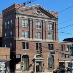 Historic brick building at Spring Street in downtown Newton, NJ, along the Holiday Parade route