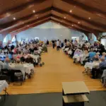 Parish center hall at Saint Jude in Hopatcong NJ filled with tables for a community event