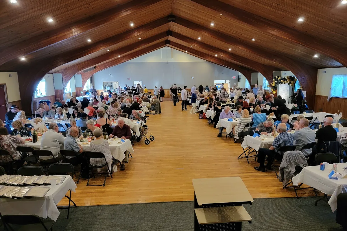 Parish center hall at Saint Jude in Hopatcong NJ filled with tables for a community event