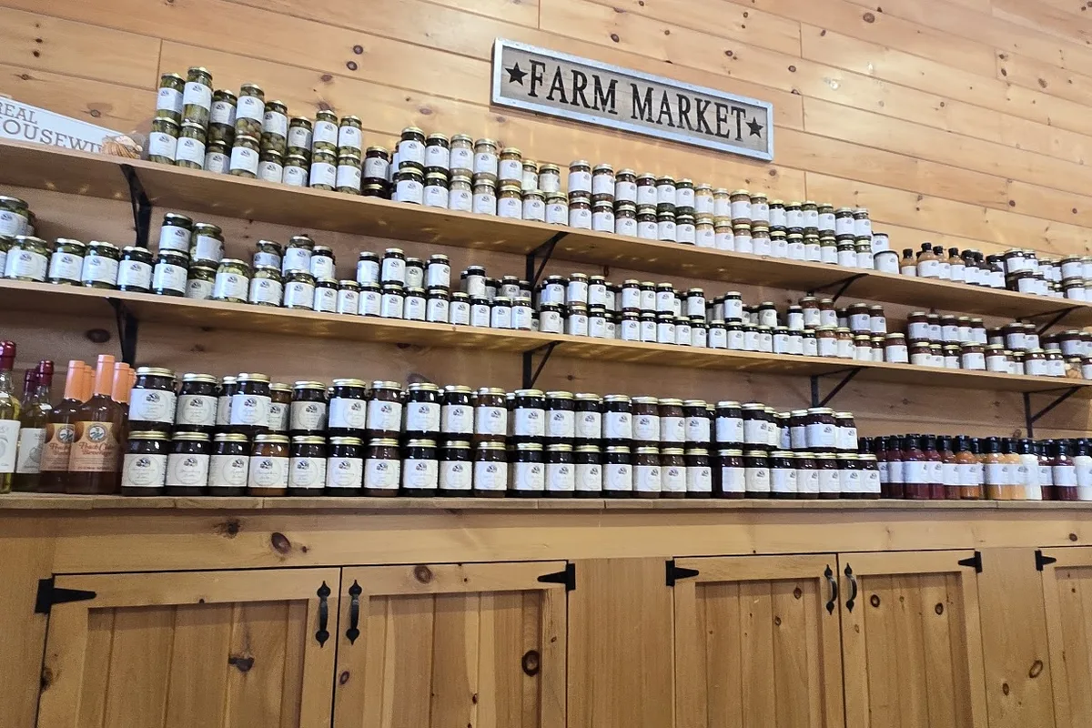 Shelves of jarred goods inside the Tranquillity Farms farm market in Green Township, NJ